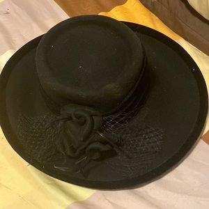 Black hat with flower on the side